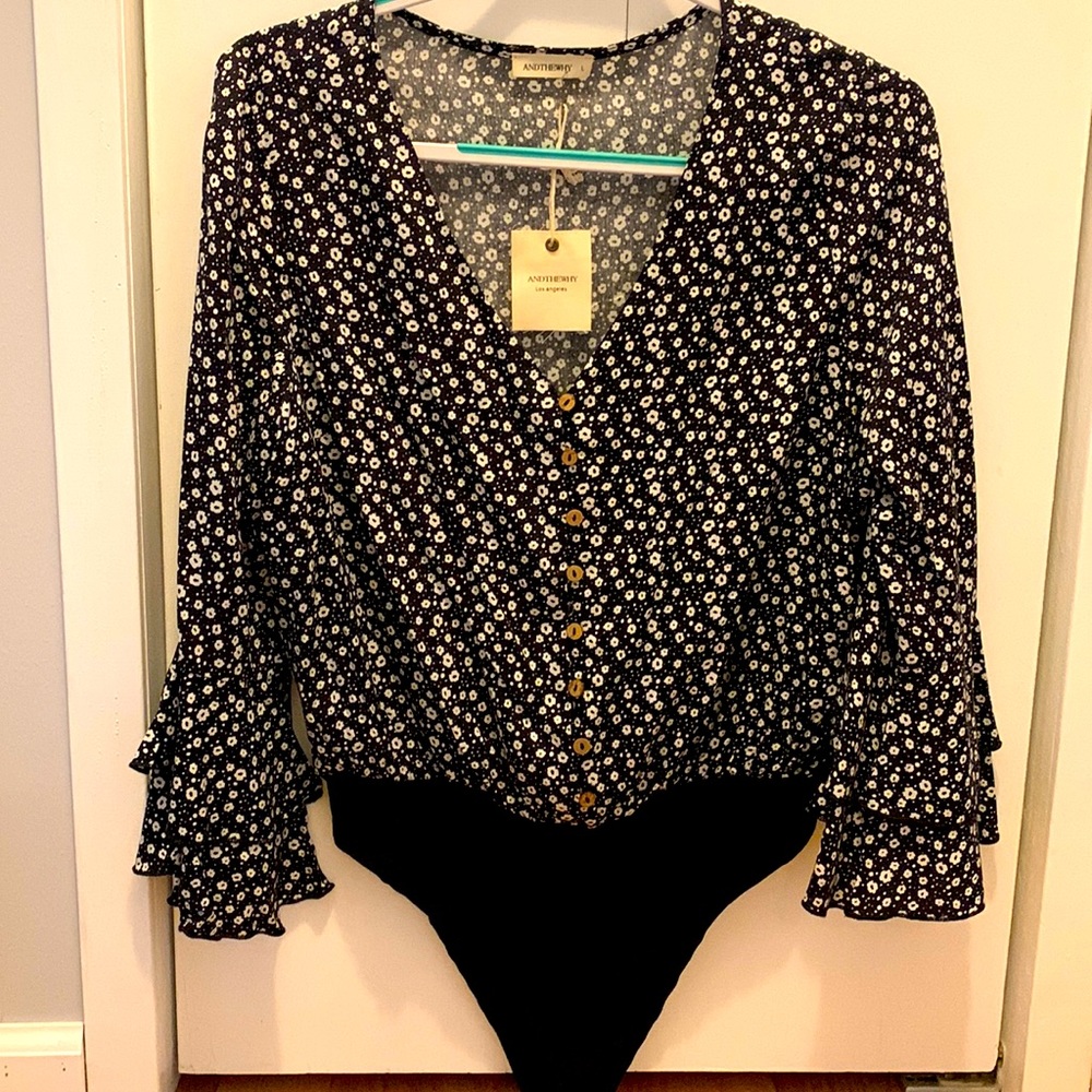 Floral black onesie, size large.